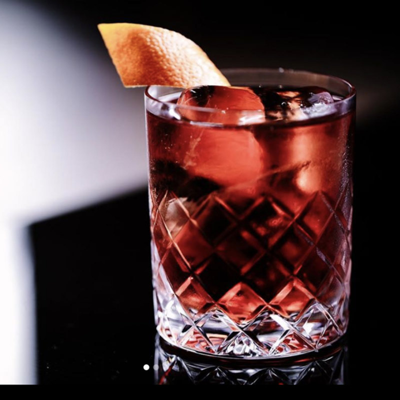 A signature Chambar cocktail — half-price wine list every Monday